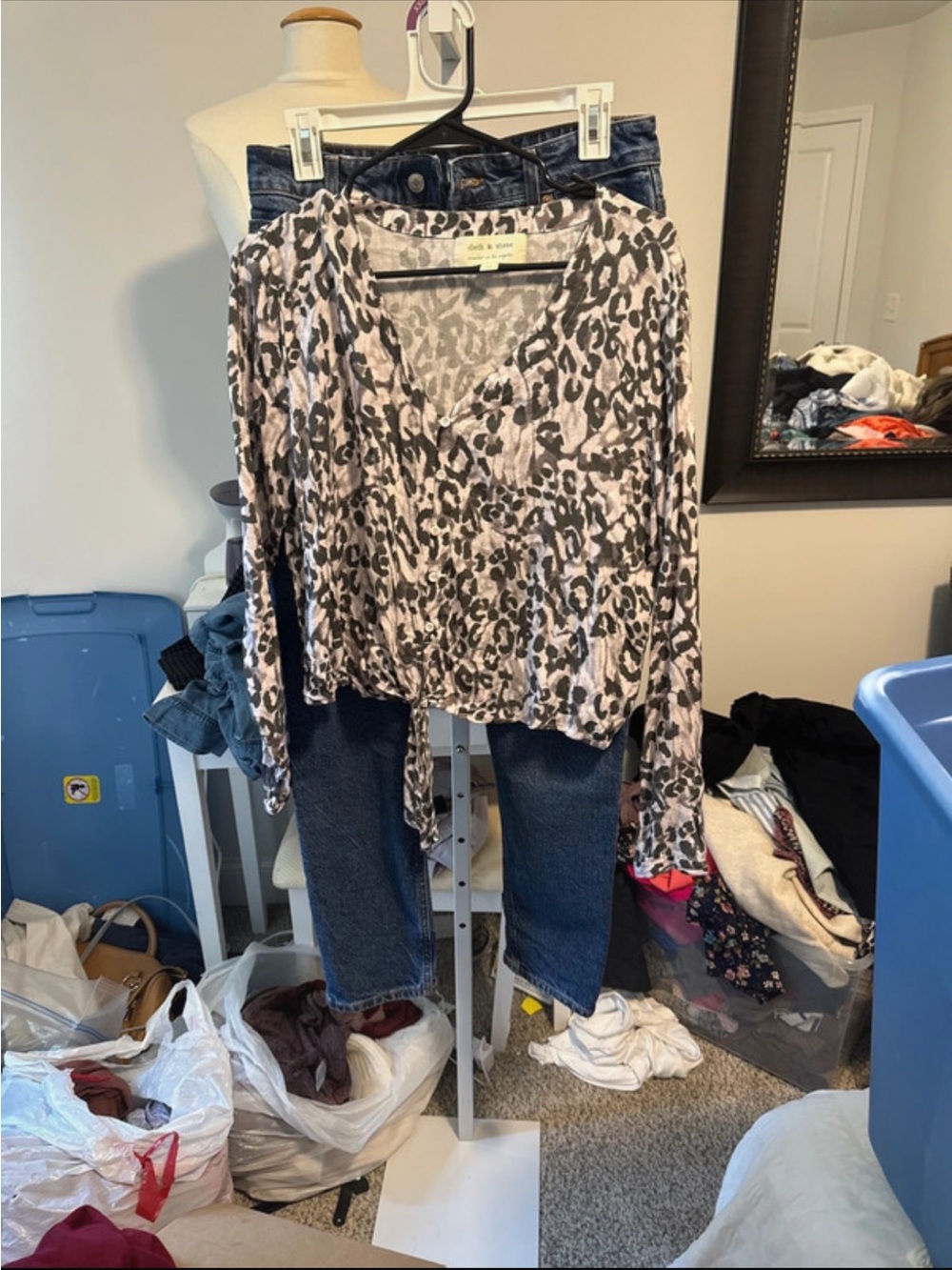 Bundle Leopard Print Wrap-Front Blouse – Gray/Taupe with a pair of jeans